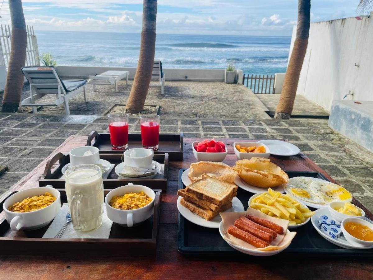 Asa Bay Beach Resort Talpe Esterno foto