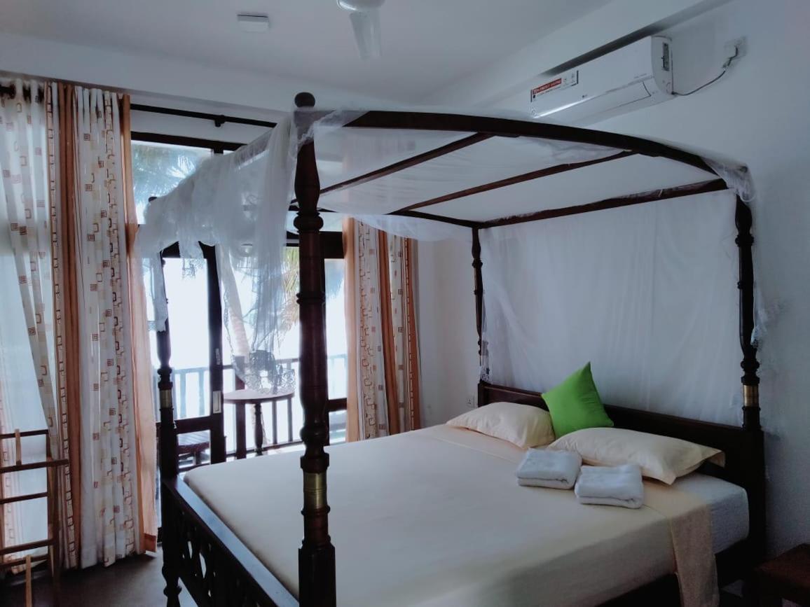 Asa Bay Beach Resort Talpe Esterno foto